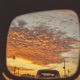 orange skies in my rear view Single