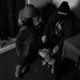 En Esta Vida feat Llanos og Single