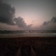 One Person in the Middle of the Beach Single