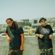 In feat DJ Rhettmatic Single